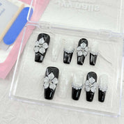 zb73..A display board featuring 24 different styles of fashionable and trendy nail wear.