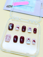 zb78..A display board featuring 24 different styles of fashionable and trendy nail wear.