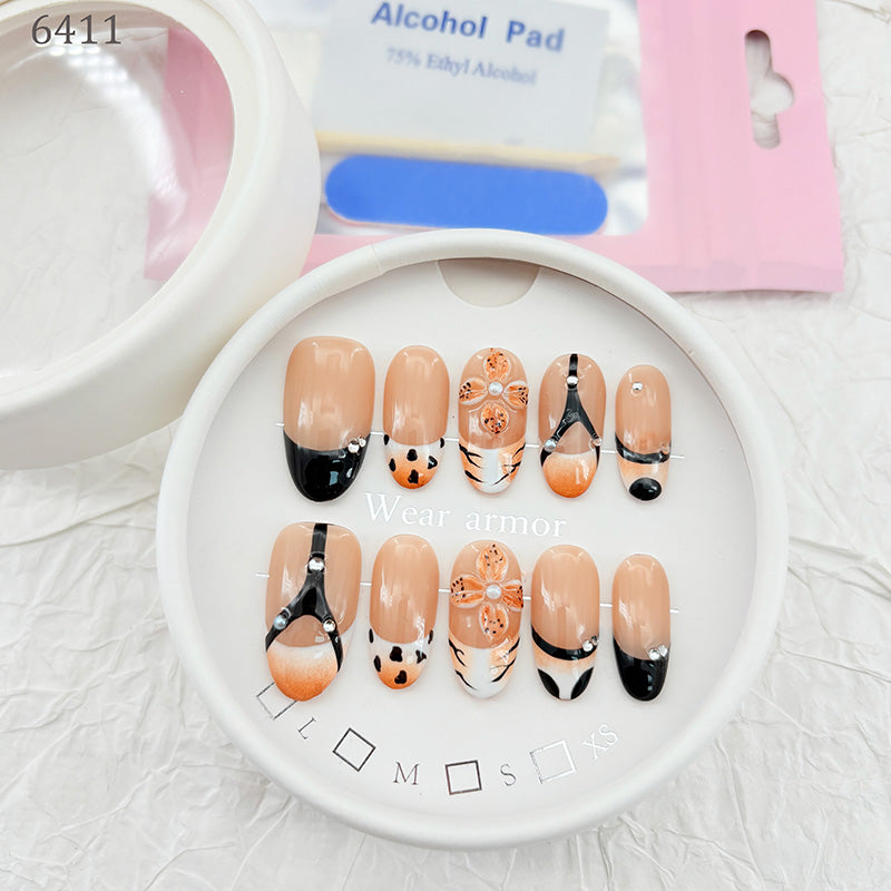 zb73..A display board featuring 24 different styles of fashionable and trendy nail wear.