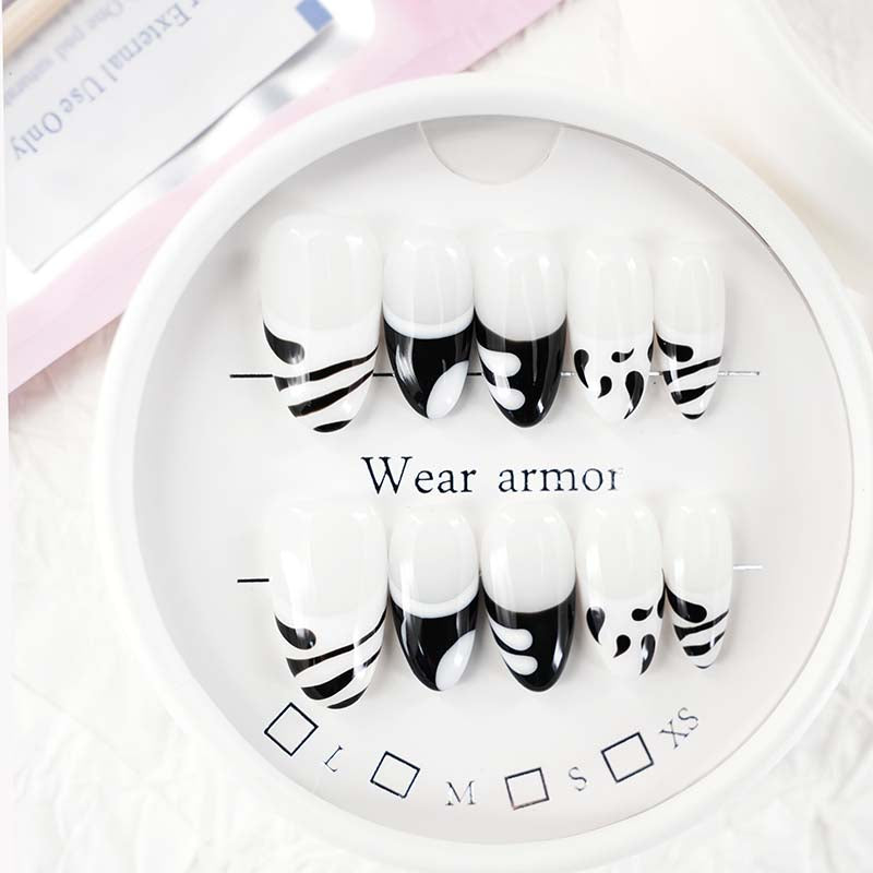 zb33..A variety of almond-shaped and square nails.