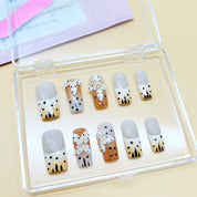 zb65..A display board featuring 24 different styles of fashionable and trendy nail art.