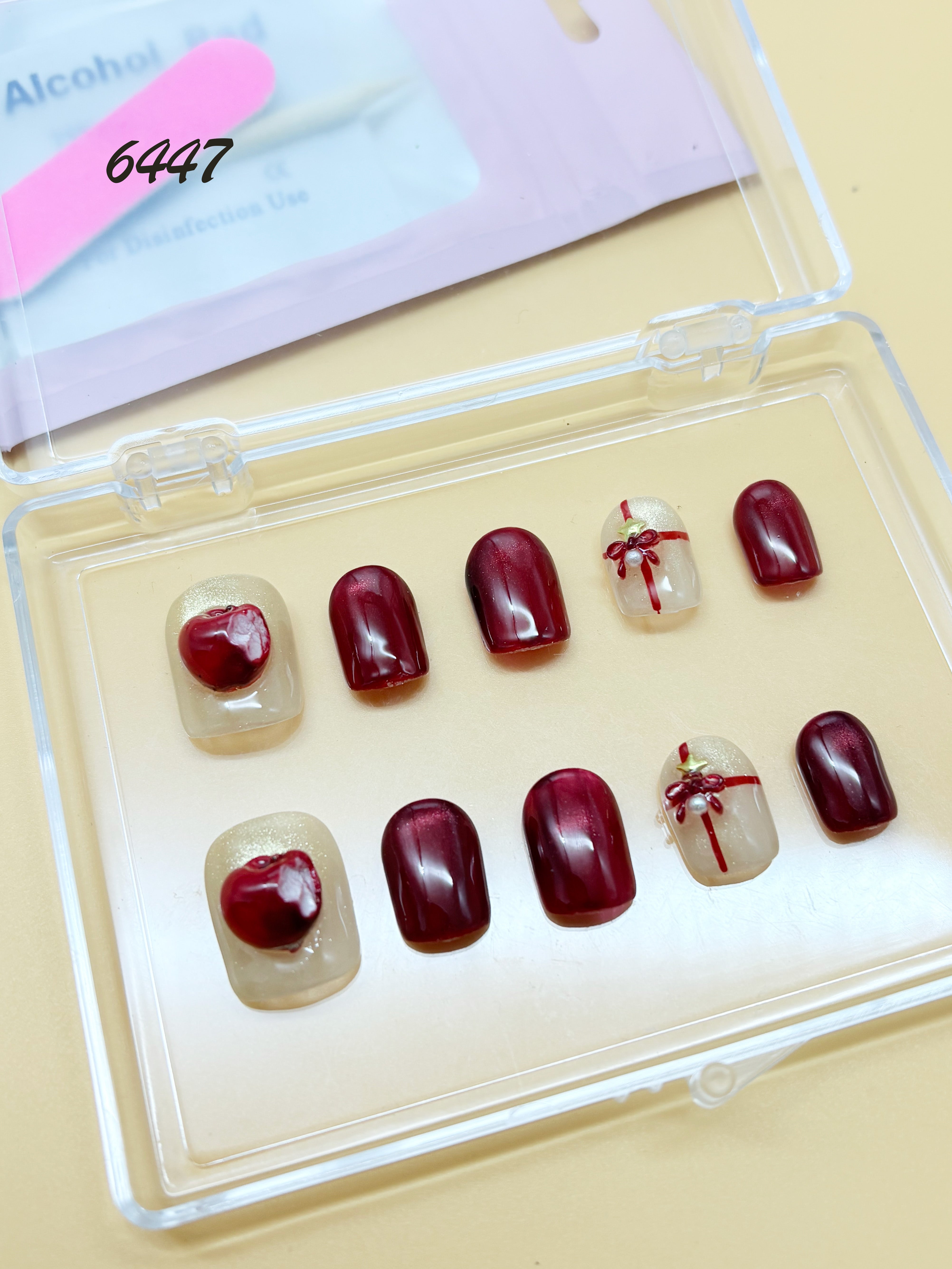 zb78..A display board featuring 24 different styles of fashionable and trendy nail wear.