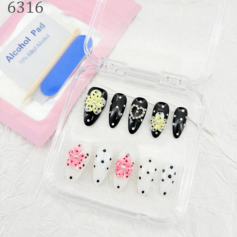 zb73..A display board featuring 24 different styles of fashionable and trendy nail wear.