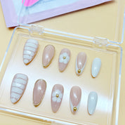 zb65..A display board featuring 24 different styles of fashionable and trendy nail art.