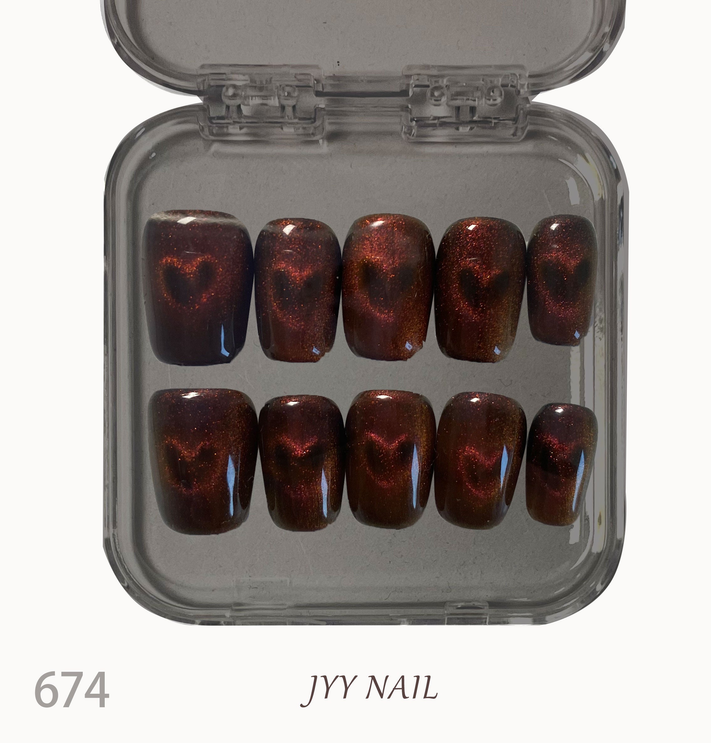 A674Orange love cat eyes：Hand-painted orange love cat eye nails