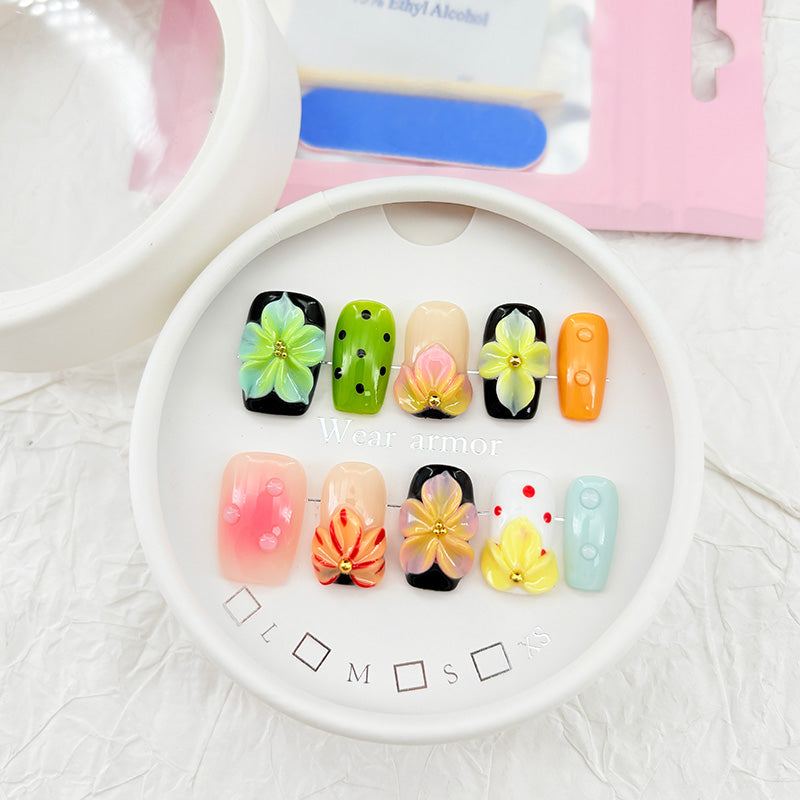 zb73..A display board featuring 24 different styles of fashionable and trendy nail wear.