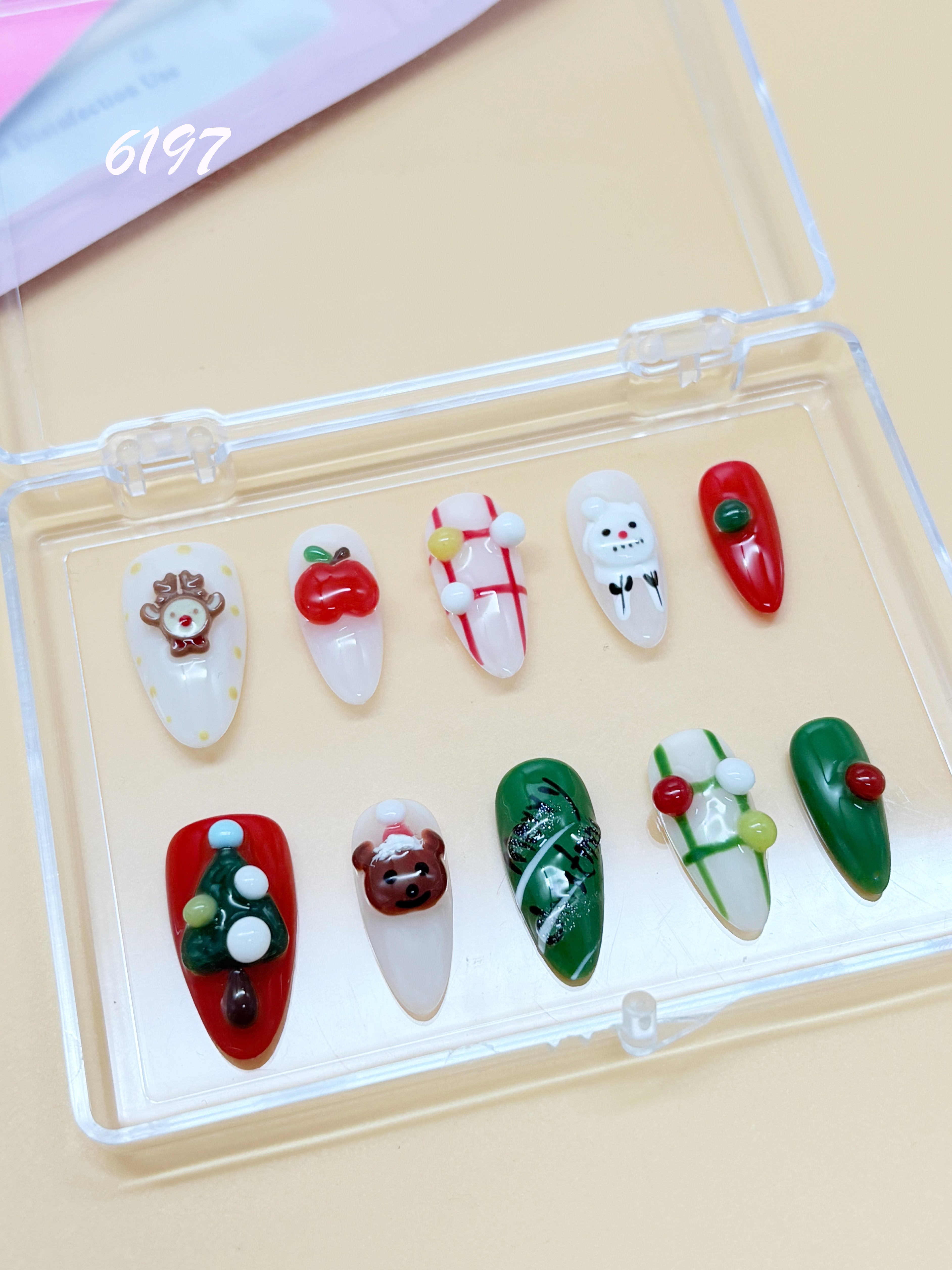 zb78..A display board featuring 24 different styles of fashionable and trendy nail wear.